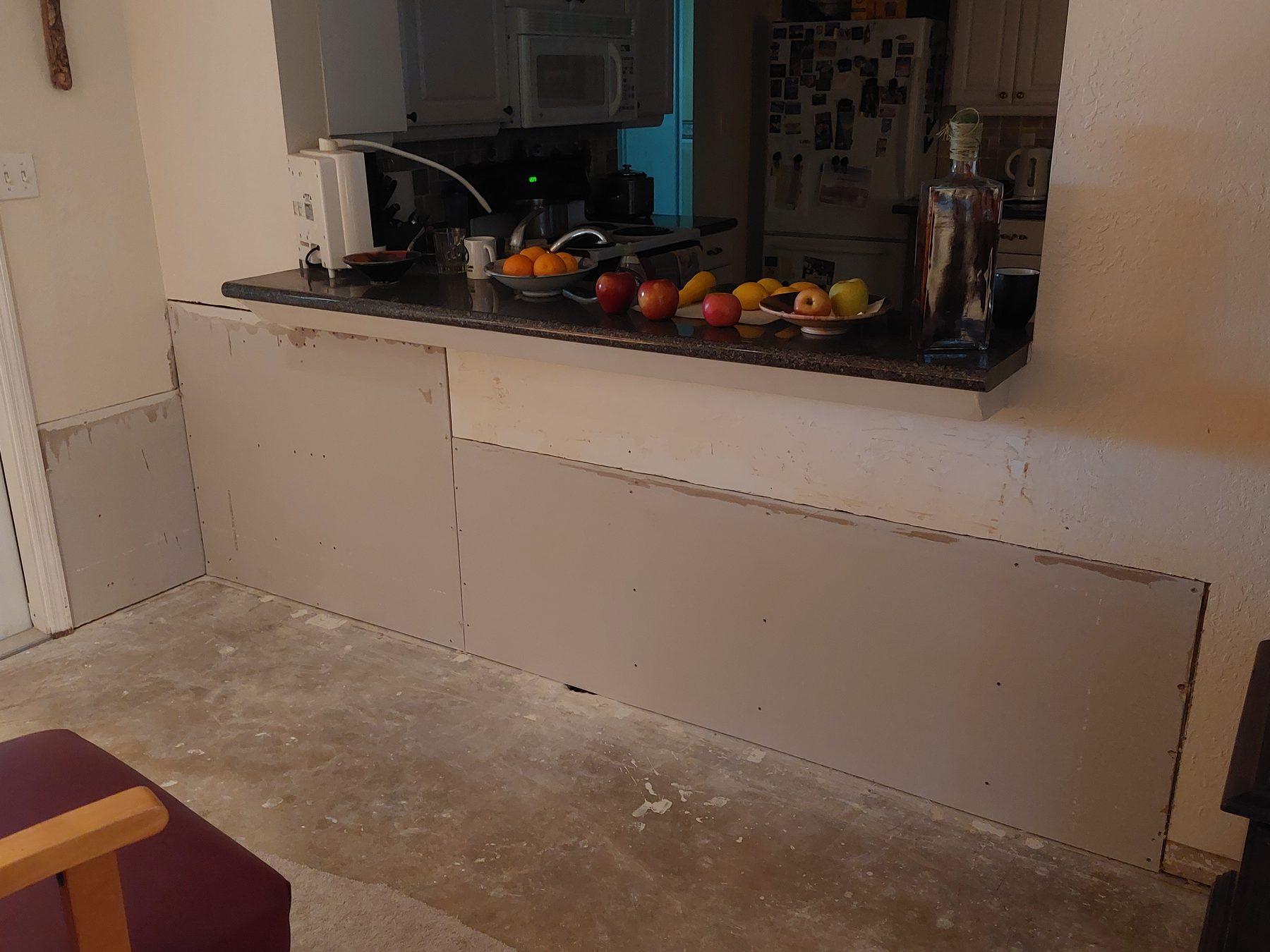 Damaged wall before repair