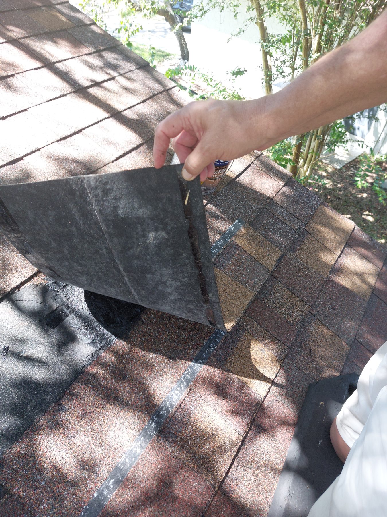 Damaged roof vent before repair